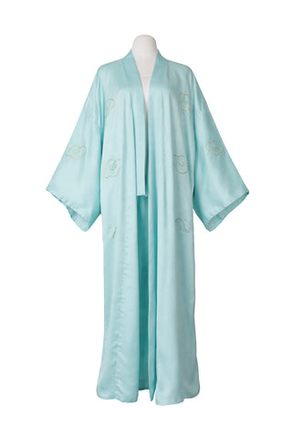 Light blue kimono-style garment on a mannequin against a white background