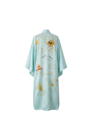 Light blue kimono with intricate gold embroidery on a white background