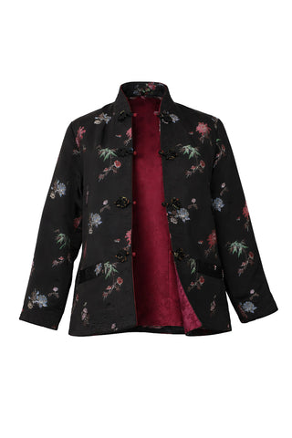 Black reversible jacket with maroon interior on white background