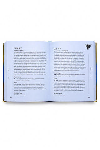 Inside of Book of Birthdays by Gaia Elliot, book with blue pages on white background