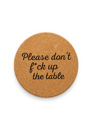 Cork coaster with text 'Please don't f*ck up the table' on a white background