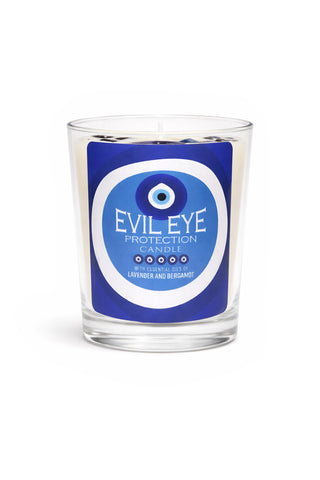 Glass candle with 'Evil Eye' label on a white background