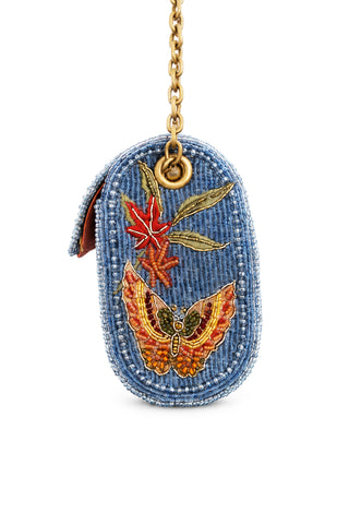 Beaded purse with butterfly and flower design on a white background