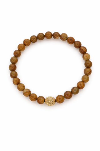 Jasper beaded bracelet with a gold accent bead on a white background
