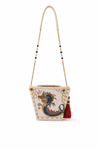 Take away box style beaded purse with dragon design and tassel on a white background