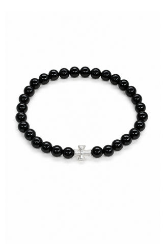 Black beaded bracelet with a silver cross on a white background