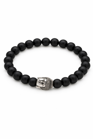 Black gunmetal beaded bracelet with a Buddha head charm on a white background