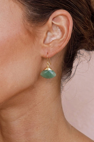 Small Jade Fan Earrings on ear with pink background
