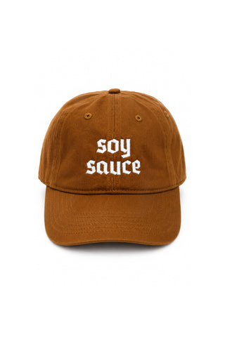 Brown cap with 'soy sauce' text on a white background