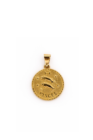 Gold zodiac pendant with Pisces design and inscription on white background
